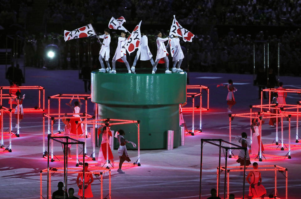 <p>Dancers perform with flags that read “Tokyo 2020” during the closing ceremony for the Summer Olympics in Rio de Janeiro, Brazil, Sunday, Aug. 21, 2016. Tokyo will host the next Summer Games in 2020. (AP Photo/Vincent Thian) </p>