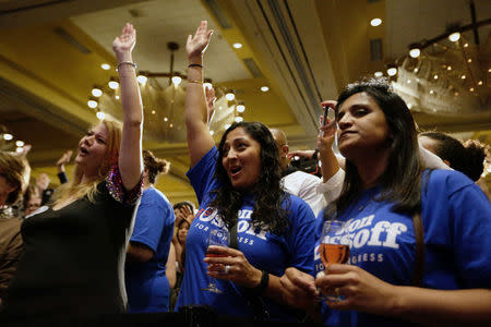 Supporters of Jon Ossoff cheer as speakers rally for Ossoff as the Georgia's Sixth District Congressional candidate Jon Ossoff's Election Night party in Sandy Springs, Georgia, U.S., April 18, 2017. REUTERS/Marvin Gentry