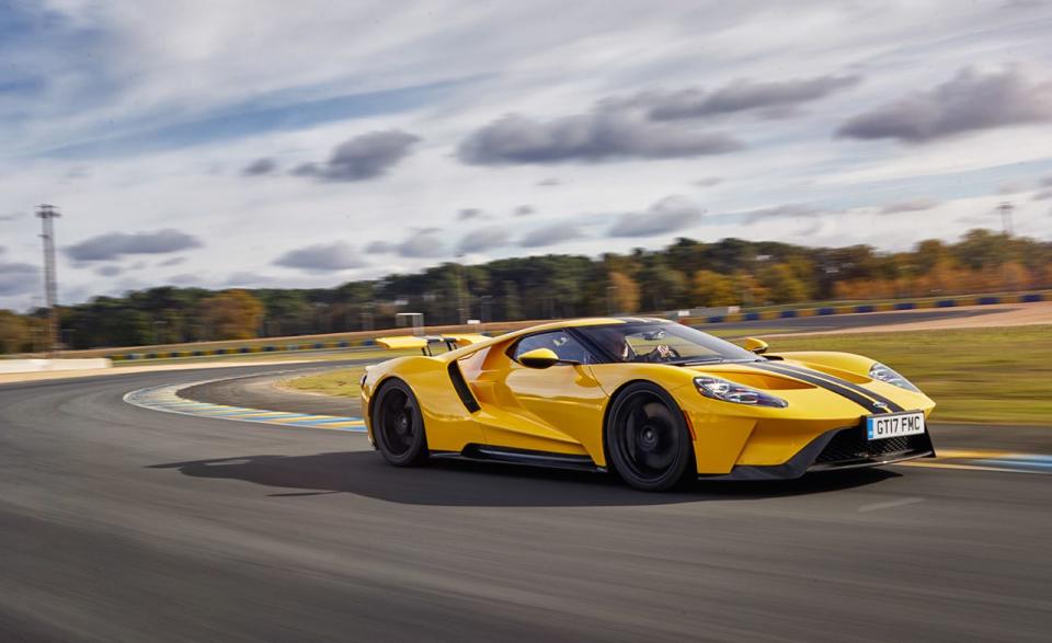 <p>It's surely no surprise that <a rel="nofollow noopener" href="https://www.caranddriver.com/reviews/ford-gt-full-test-of-the-blue-oval-supercar-review" target="_blank" data-ylk="slk:today's carbon-fiber, half-million-dollar Ford GT supercar;elm:context_link;itc:0;sec:content-canvas" class="link ">today's carbon-fiber, half-million-dollar Ford GT supercar</a> tops our roundup of the quickest-ever Ford models, given its 647-hp twin-turbo 3.5-liter V-6 motivating a trim 3381 pounds. With its lightning-quick-shifting seven-speed dual-clutch automatic, track-focused hardware, and racing-derived aerodynamics, the modern GT is a proper speed machine with legitimate race-winning credentials (see Ford's Le Mans class victory in 2016). While it's more at home turning lap times than racing for pink slips, it is by far the quickest production car the Blue Oval has churned out: zero to 60 mph in 3.0 seconds flat with a blazing quarter-mile pass of 10.8 at 134 mph.<br></p>