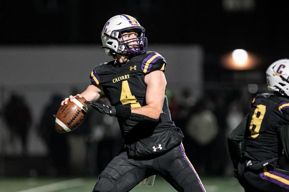 Calvary Day’s quarterback Jake Merklinger drops back and completed a pass down field.