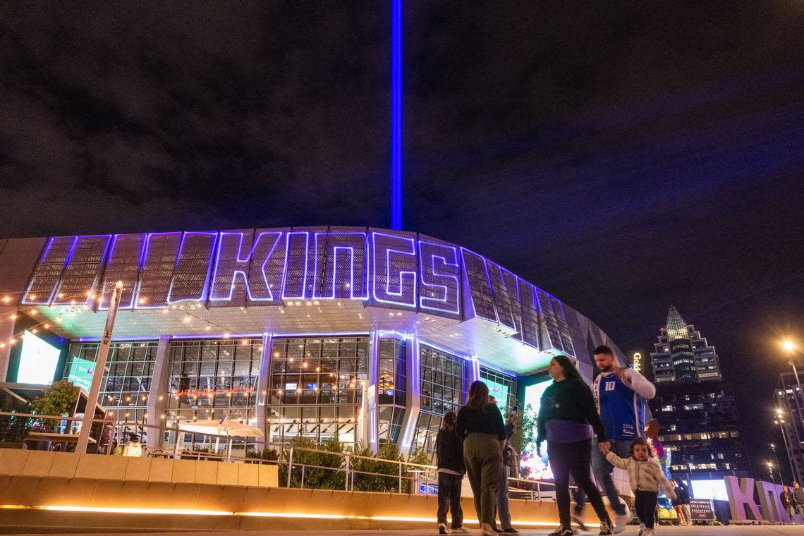 Sacramento Kings fans walk past the beam after the Kings won 123-117 against the defending champions Denver Nuggets during an NBA basketball game Saturday, Dec. 2, 2023, at Golden 1 Center.