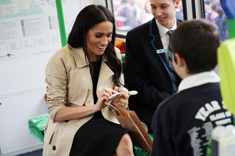 Meghan is showered with gifts on the tram (Getty Images)