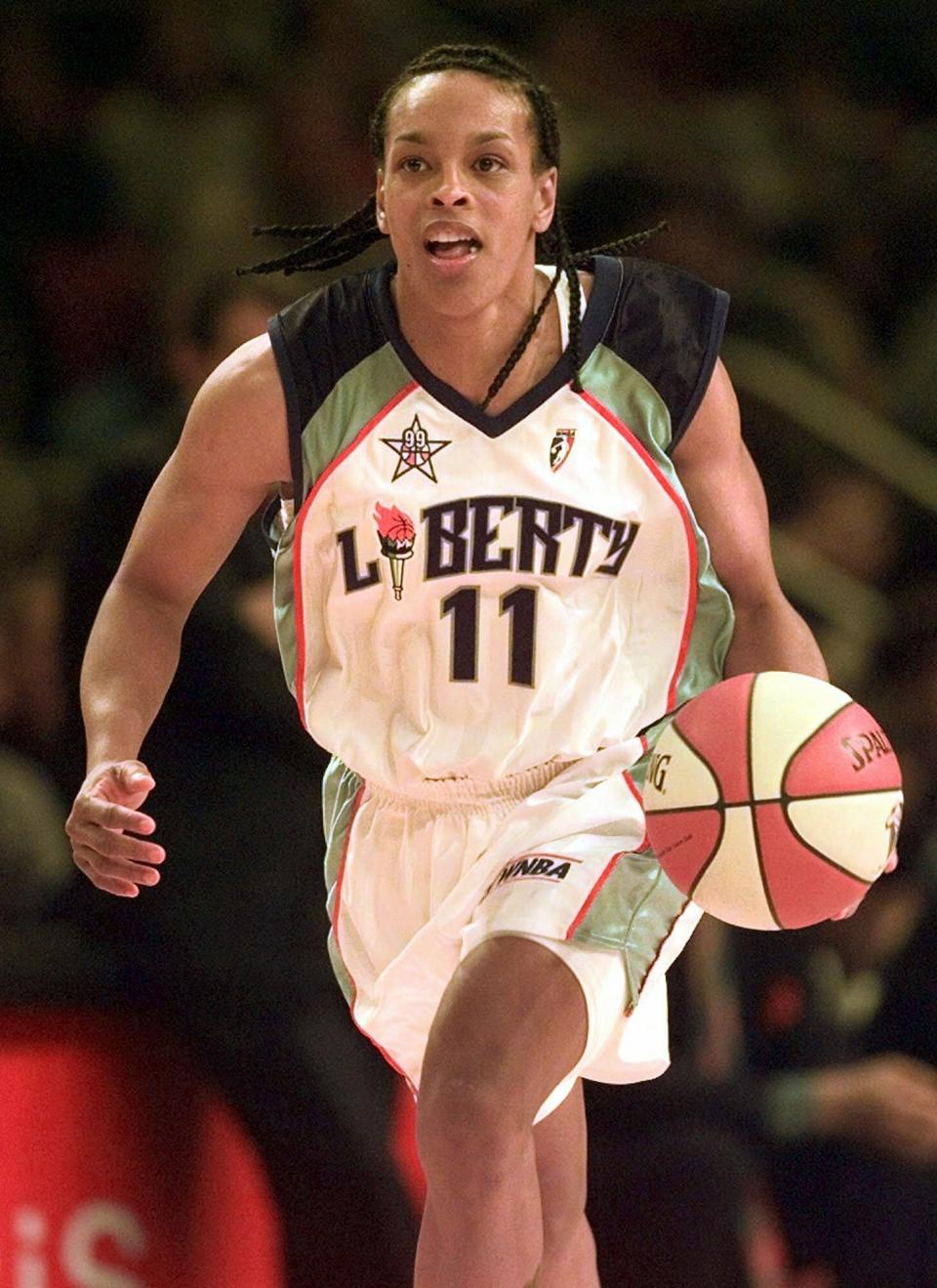 FILE - In this July 14, 1999, file photo, Eastern Conference's Teresa Weatherspoon, of the New York Liberty, drives down the court during the inaugural WNBA All-Star basketball game at New York's Madison Square Garden. The West defeated the East 79-61. Weatherspoon is among 13 finalists for enshrinement later this year into the Basketball Hall of Fame. (AP Photo/Kathy Willens, File)