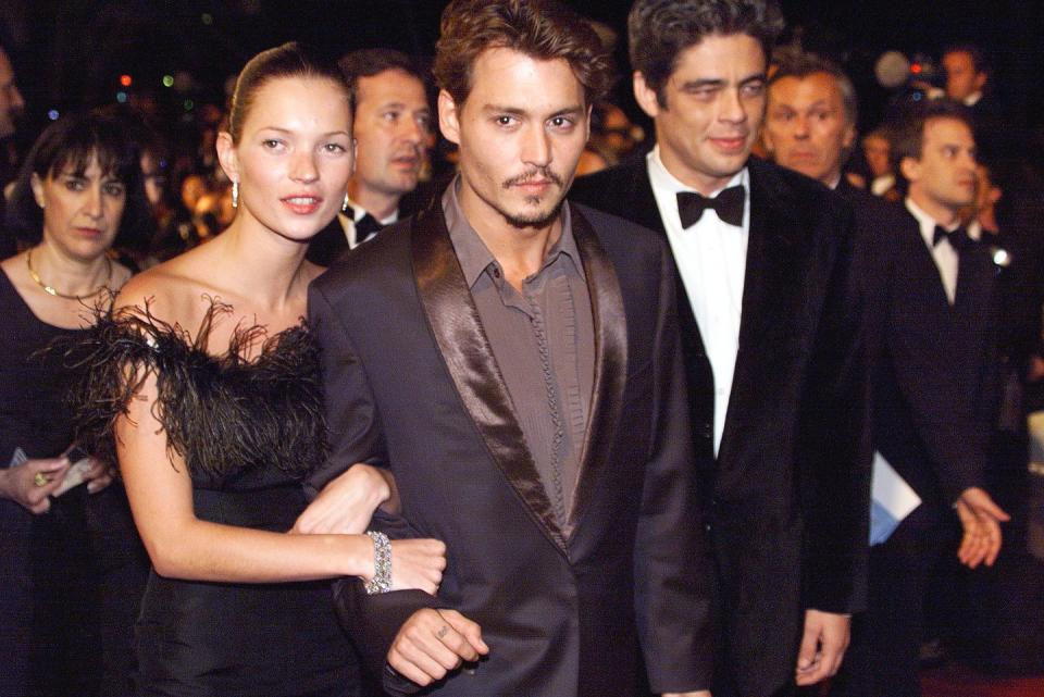 us actors johnny depp c and benito del toro r