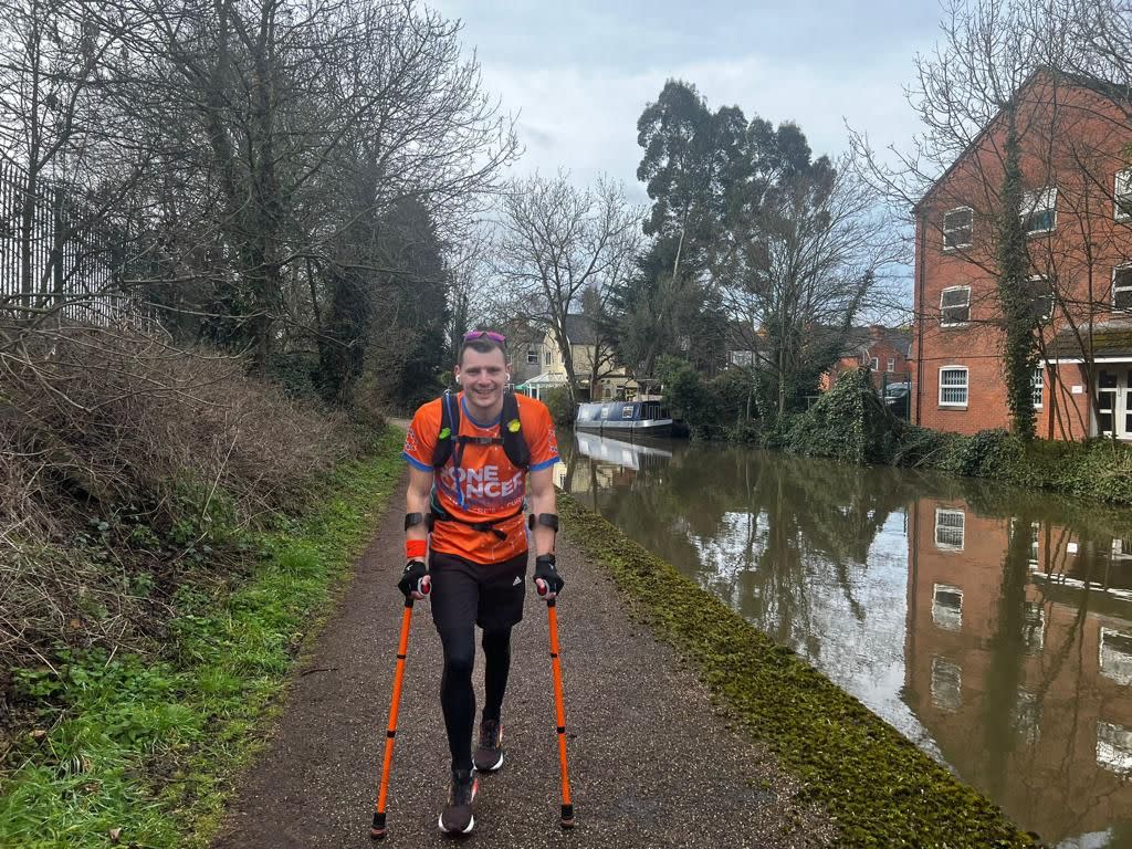 Man walking with crutches 