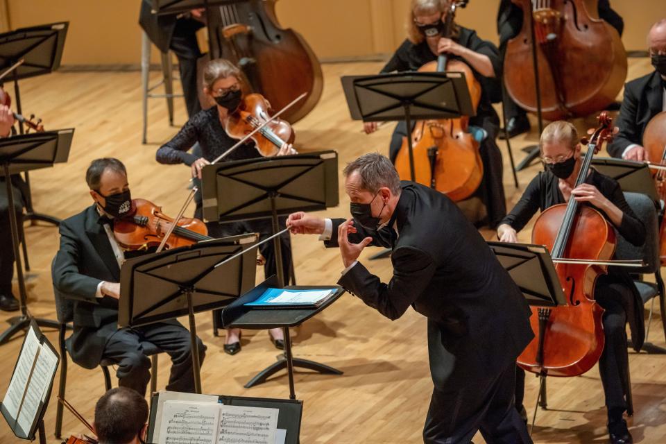 In this file photo, South Bend Symphony Orchestra Music Director Alastair Willis conducts the orchestra on April 10, 2021, at the Morris Performing Arts Center in South Bend.