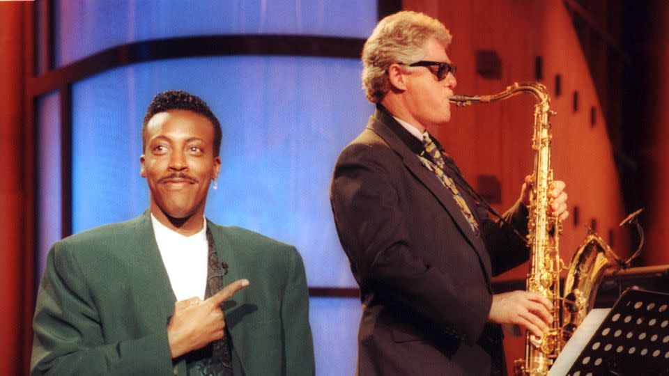 Bill Clinton plays 'Heartbreak Hotel' on saxophone on June 3, 1992 during a taping of 'The Arsenio Hall Show.' - Reed Saxon/AP