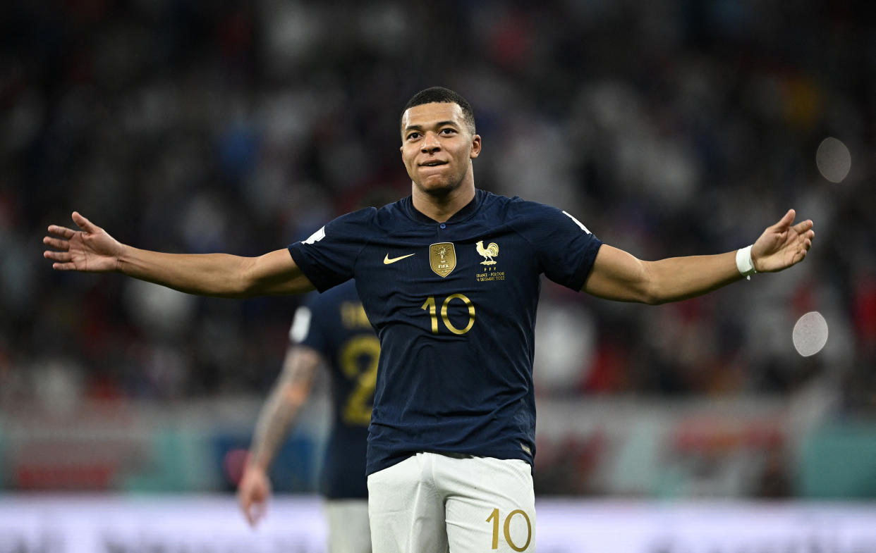 France forward Kylian Mbappe celebrates scoring their third goal against Poland in the last-16 of the 2022 World Cup.