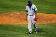 ST LOUIS, MO - OCTOBER 27: Neftali Feliz #30 of the Texas Rangers walks off the mound at the end of the ninth inning during Game Six of the MLB World Series against the St. Louis Cardinals at Busch Stadium on October 27, 2011 in St Louis, Missouri. (Photo by Dilip Vishwanat/Getty Images)