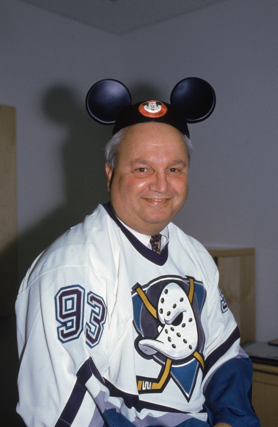 Hockey executive Jack Ferreira wears Mickey Mouse ears in the 1990s.