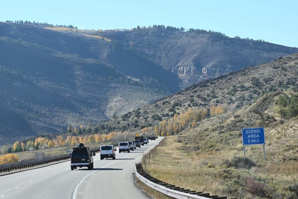 The Presidential motorcade, with US President Joe Biden on board, drives from Camp Hale to Eagle County Regional Airport in Gypsum, Colorado, on October 12, 2022.