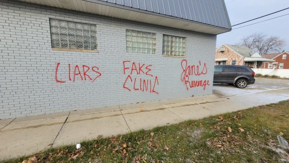 Pro-abortion messages spray-painted on the exterior wall of Pregnancy Aid Detroit clinic in Eastpointe on Dec. 17, 2022.