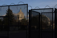 A section of fencing with razor wire blocking the Capitol grounds, Monday, March 1, 2021, is seen in Washington. (AP Photo/Jacquelyn Martin)