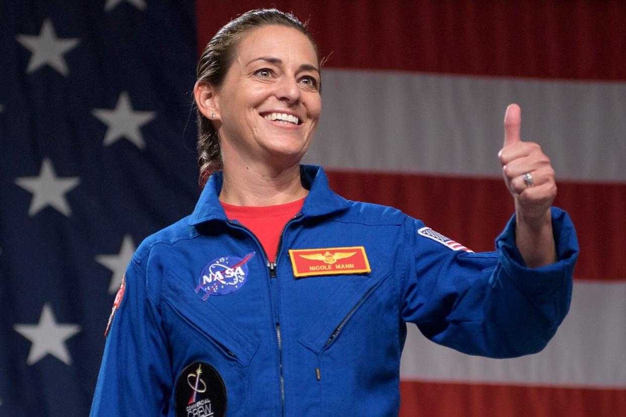 In this NASA handout, NASA astronaut Nicole Aunapu Mann is seen during a NASA event where it was announced that she, NASA astronaut Eric Boe, and Boeing astronaut Chris Ferguson are assigned to the Boeing CST-100 Starliner Crew Test Flight to the International Space Station, Friday, Aug. 3, 2018 at NASAs Johnson Space Center in Houston, Texas. Astronauts assigned to crew the first flight tests and missions of the Boeing CST-100 Starliner and SpaceX Crew Dragon were announced during the event.