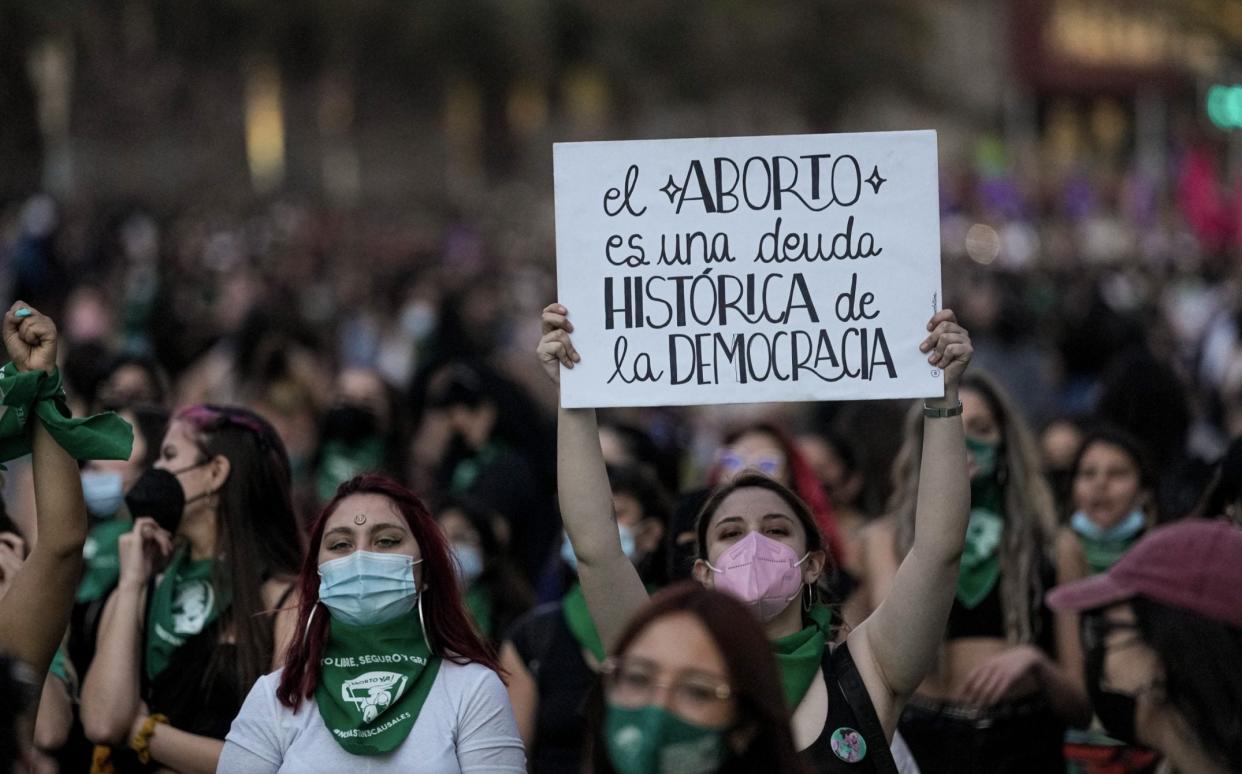 Abortion rights demonstrators march during a Global Day of Action for access to legal, safe and free abortion in Santiago, Chile - Esteban Felix/AP