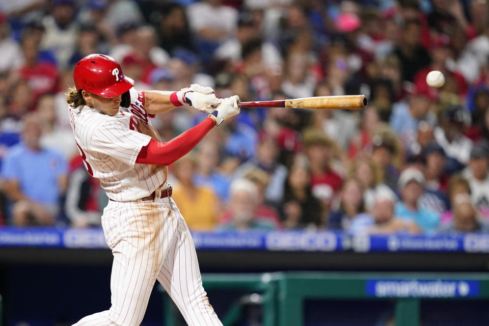 Philadelphia Phillies' Alec Bohm hits a single against Atlanta Braves pitcher Spencer Strider during the fifth inning of a baseball game, Tuesday, July 26, 2022, in Philadelphia. (AP Photo/Matt Slocum)