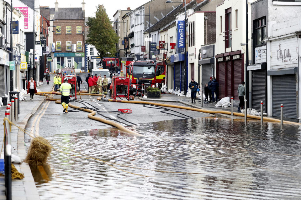 Northern Ireland Fire and Rescue Service continue to pump water from flooded premises in Downpatrick town centre. Picture date: Saturday November 4, 2023. (Photo by Peter Morrison/PA Images via Getty Images)