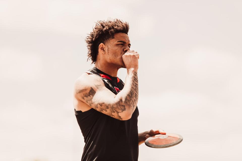 Texas Tech junior Devin Roberson prepares to step up and throw the discus Friday at the Masked Rider Open. Roberson won the competition with a throw of 194 feet even.