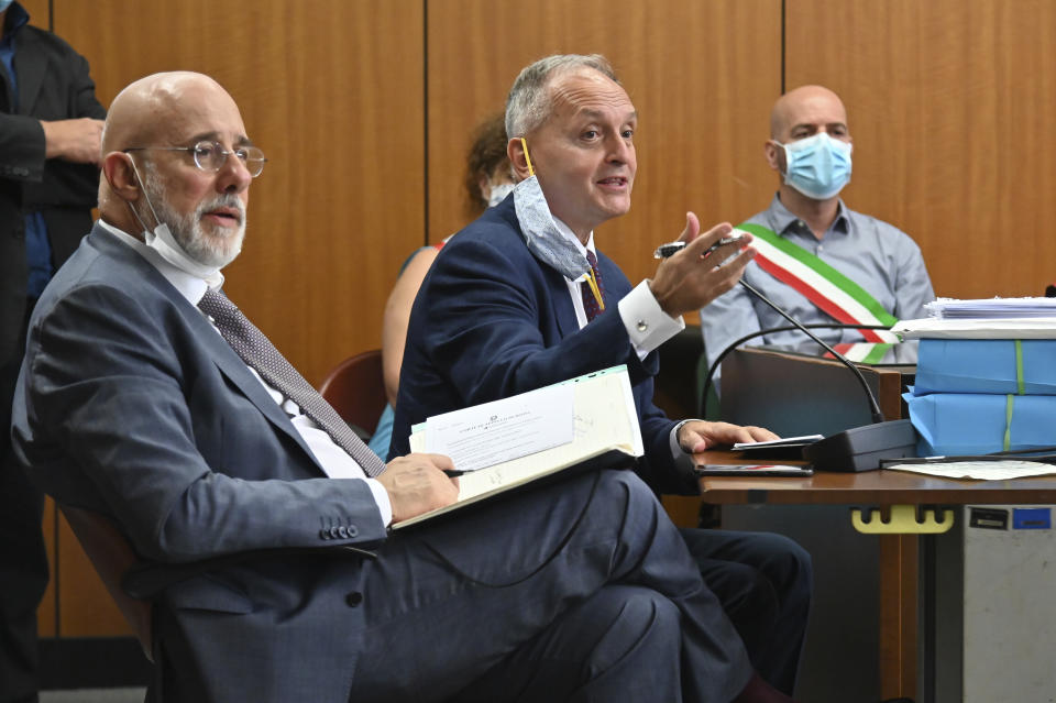 Psychiatric experts Vittorio Fineschi speaks next to his colleague Stefano Ferracuti, during trial for the killing of Italian Carabinieri police officer Mario Cerciello Rega, in Rome, Wednesday, July 22, 2020. Court-appointed psychiatrists testified on Wednesday that a young Californian man, accused of murdering an Italian police office, suffers from anxiety, depression and “a sense of chronic anger” but is competent to stand trial. A psychiatric evaluation was requested by defense lawyers for Finnegan Lee Elder, 20, on trial in Rome since February for the slaying of a plainclothes Carabinieri police officer. (Andreas Solaro/Pool via AP)