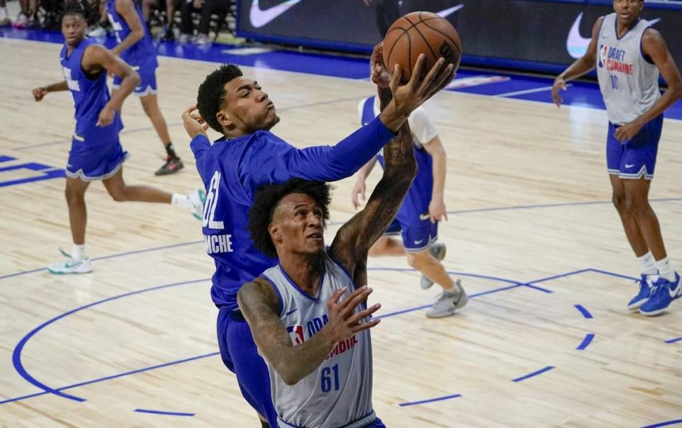 Ulrich Chomche (62) and Jalen Bridges (61) participate during the 2024 NBA Draft Combine at Wintrust Arena.