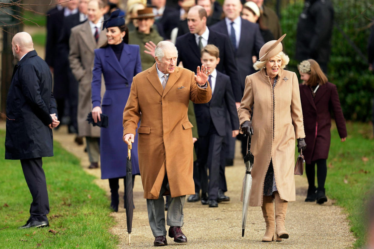 Britain's King Charles III waves (Kin Cheung / AP)