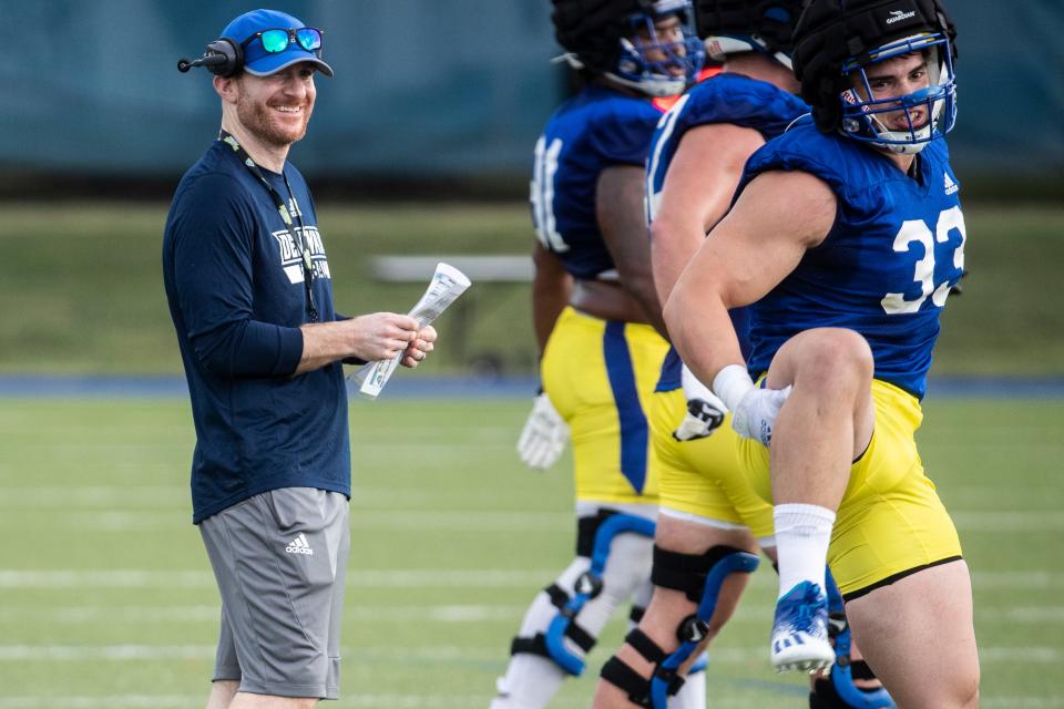 Delaware Blue Hens head coach Ryan Carty leads the first preseason football practice, his first as head coach, at the University of Delaware football practice field on Friday, Aug. 5, 2022.