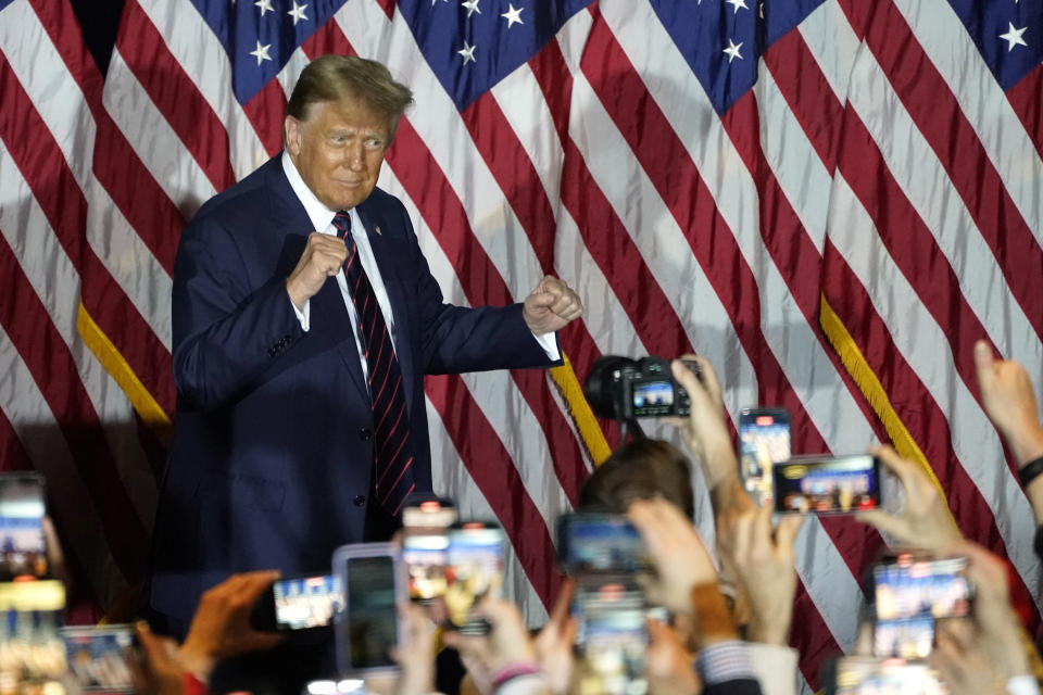 Republican presidential hopeful and former US President Donald Trump gestures during an Election Night Party in Nashua, New Hampshire, on January 23, 2024. Donald Trump won the key New Hampshire primary Tuesday, moving him ever closer to locking in the Republican presidential nomination and securing an extraordinary White House rematch with Joe Biden. (Photo by TIMOTHY A. CLARY / AFP) (Photo by TIMOTHY A. CLARY/AFP via Getty Images)