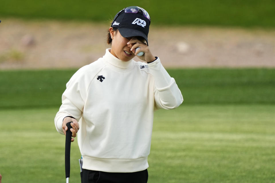 Danielle King reacts after missing her putt on the seventh green during the first round of the Drive On Championship golf tournament, Thursday, March 23, 2023, in Gold Canyon, Ariz. (AP Photo/Matt York)