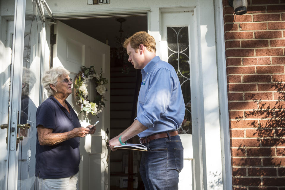 Democrat Chris Hurst, right, canvasses in Blacksburg, Virginia, in July. Hurst unseated Republican Joseph Yost on Tuesday. (Photo: The Washington Post/Getty Images)