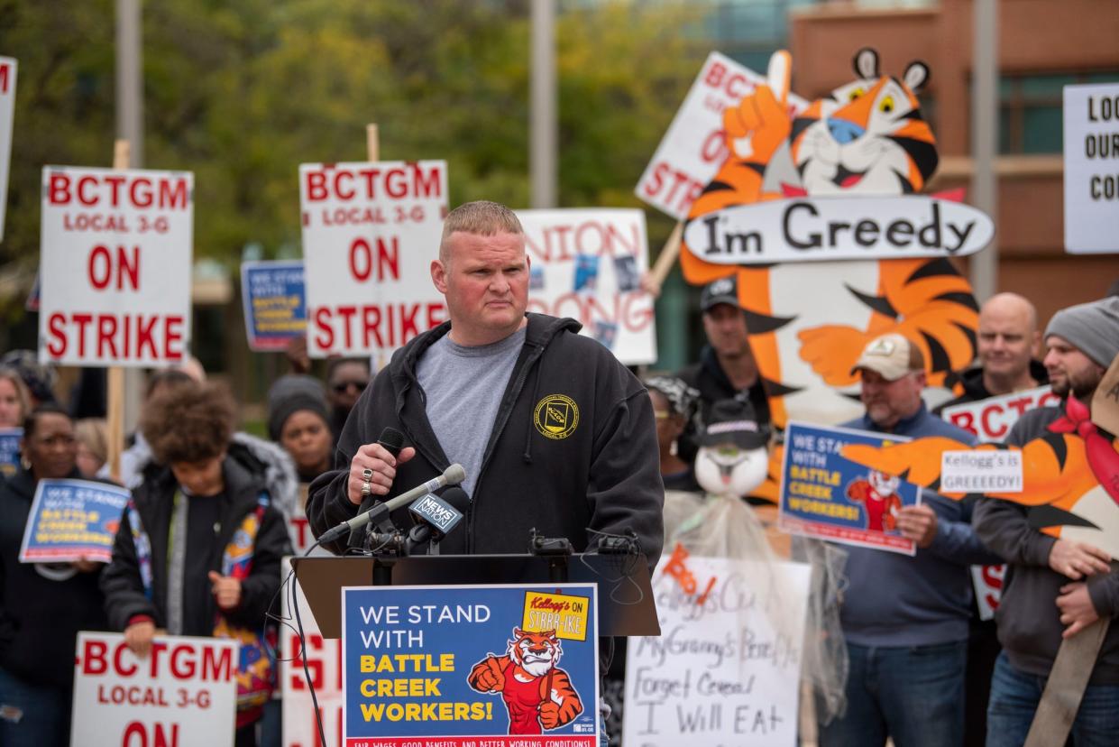 Trevor Bidelman, president of the BCTGM Local 3-G, speaks during a rally outside Kellogg's World Headquarters on Wednesday, Oct. 27, 2021 to support workers on strike in Battle Creek, Michigan.