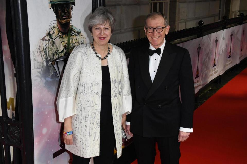 Theresa May and husband Philip attend The Sun Military Awards following the vote (Getty Images)