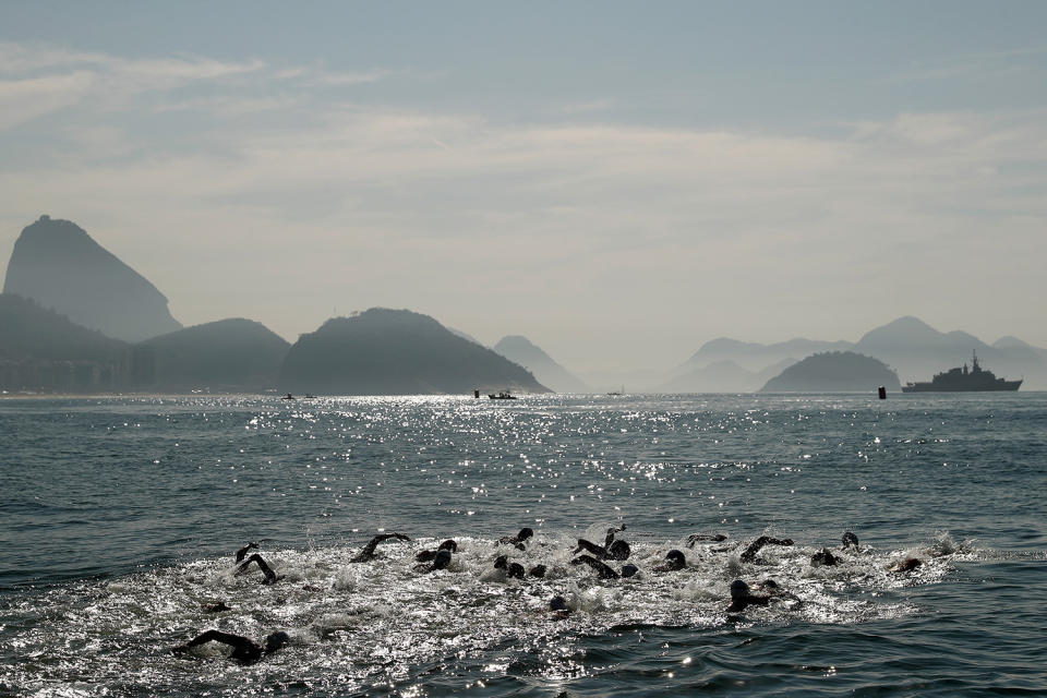 <p>The competitors swim in the Women’s 10km Marathon Swimming on day 10 of the Rio 2016 Olympic Games at Fort Copacabana on August 15, 2016 in Rio de Janeiro, Brazil. (Photo by Clive Rose/Getty Images) </p>