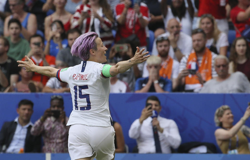 United States' Megan Rapinoe celebrates after scoring her side's opening goal during the Women's World Cup final soccer match between US and The Netherlands at the Stade de Lyon in Decines, outside Lyon, France, Sunday, July 7, 2019. (AP Photo/David Vincent)