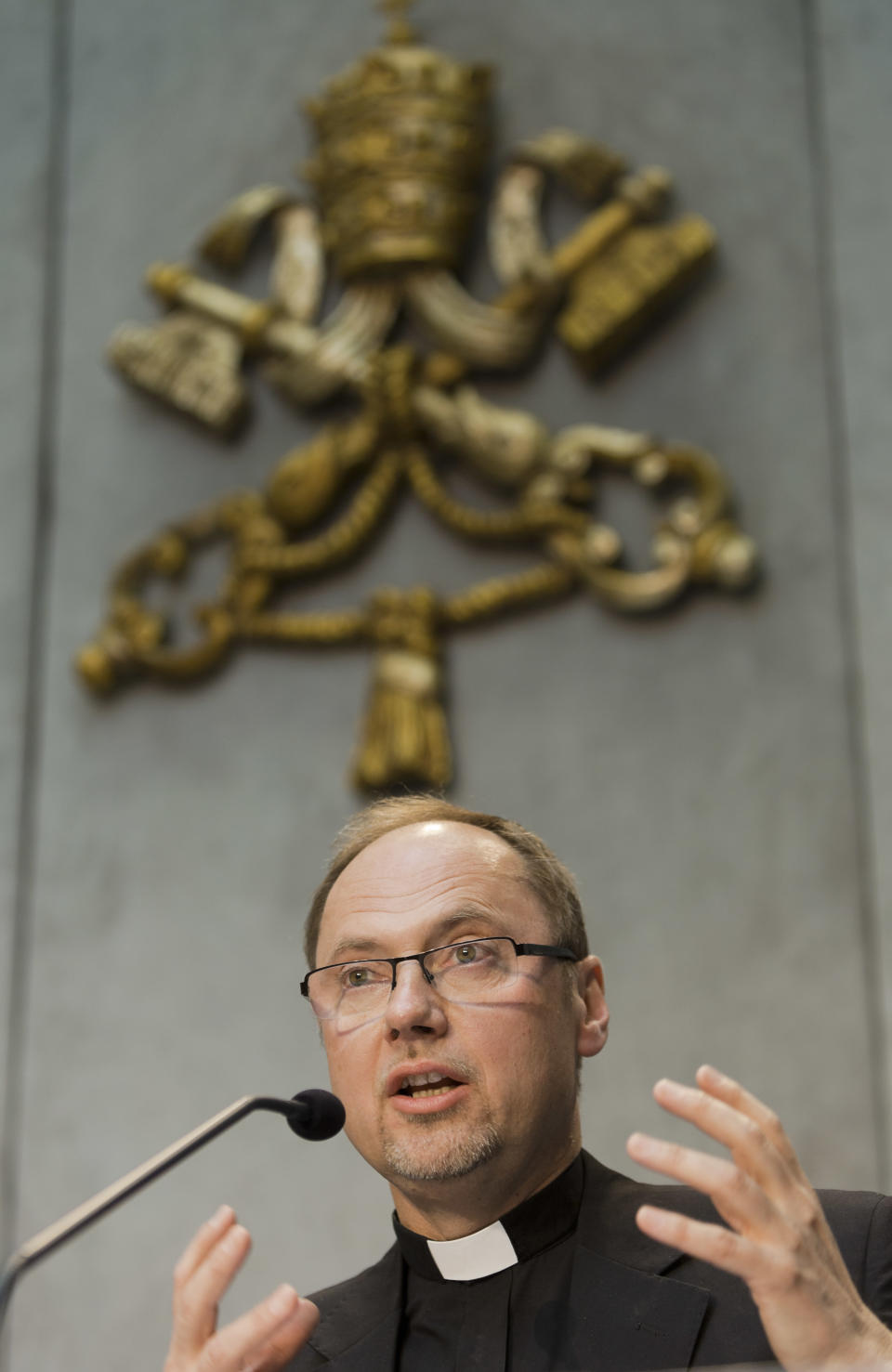 Monsignor Slawomir Oder, postulator of late Pope John Paul II, speaks during a press conference in Vatican City, Tuesday, April 22, 2014. Polish priest Oder, who has spearheaded the case to make Pope John Paul II a saint, says there is no documentation that he had any "personal involvement" in the scandal of the Legion of Christ religious order. John Paul and his closest advisers had held up the Legion and its late founder, the Rev. Marcial Maciel, as a model for the faithful, even though the Vatican for decades had documentation with credible allegations that Maciel was a pedophile and drug addict with a questionable spiritual life. (AP Photo/Domenico Stinellis)