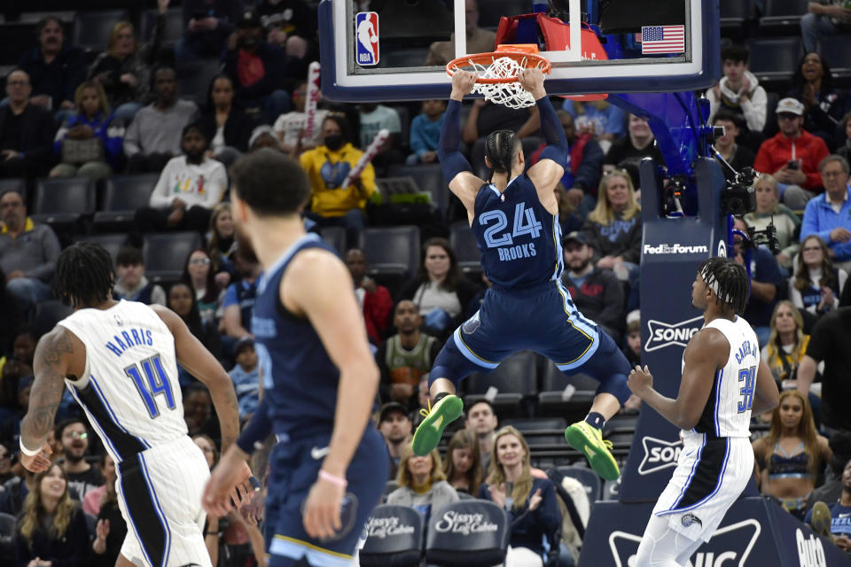 Memphis Grizzlies forward Dillon Brooks (24) dunks in the first half of an NBA basketball game against the Orlando Magic Tuesday, March 28, 2023, in Memphis, Tenn. (AP Photo/Brandon Dill)