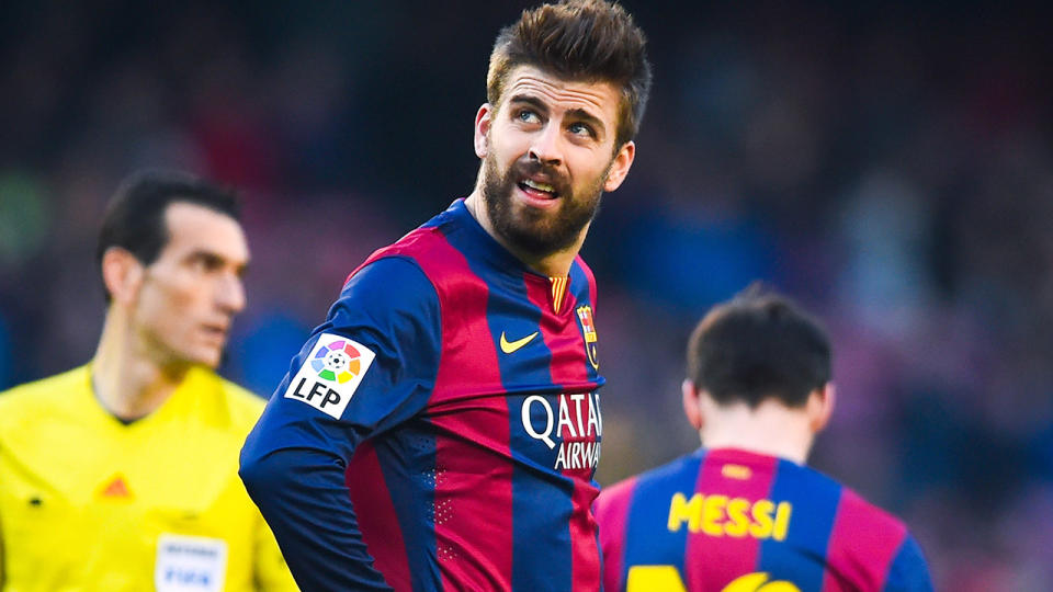 Gerard Pique of FC Barcelona looks on dejected after missing a chance to score against Malaga CF at Camp Nou on February 21, 2015 in Barcelona, Spain. (Photo by David Ramos/Getty Images)