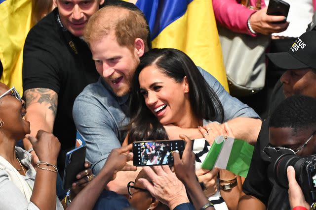 <p>SplashNews</p> Prince Harry and Meghan Markle attend the Ukraine - Nigeria match of sitting volleyball at the 2023 Invictus Games.