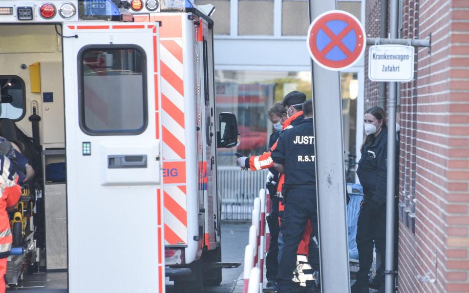 Christian Brückner getting marched into an ambulance - Splash News 