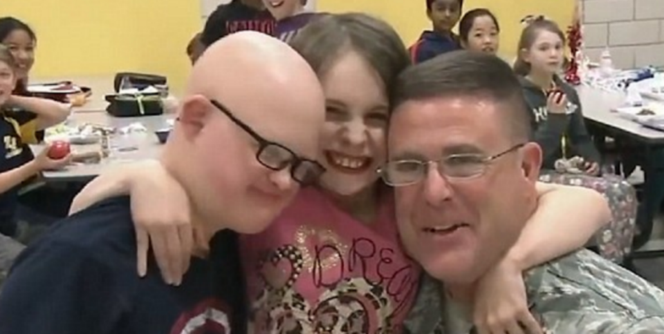 Joshua, Jessica and father John Grieten. Photo: Military Surprises YouTube.