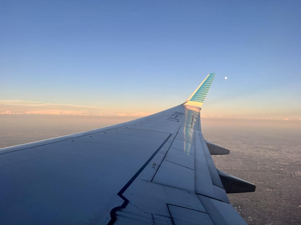 Out the window of an aircraft window.