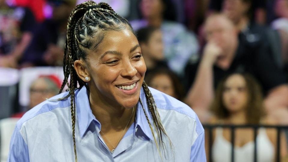 PHOTO: Candace Parker of the Las Vegas Aces looks on from the bench before Game Two of the 2023 WNBA Playoffs finals against the New York Liberty in Las Vegas, NV, Oct. 11, 2023. (Ethan Miller/Getty Images)