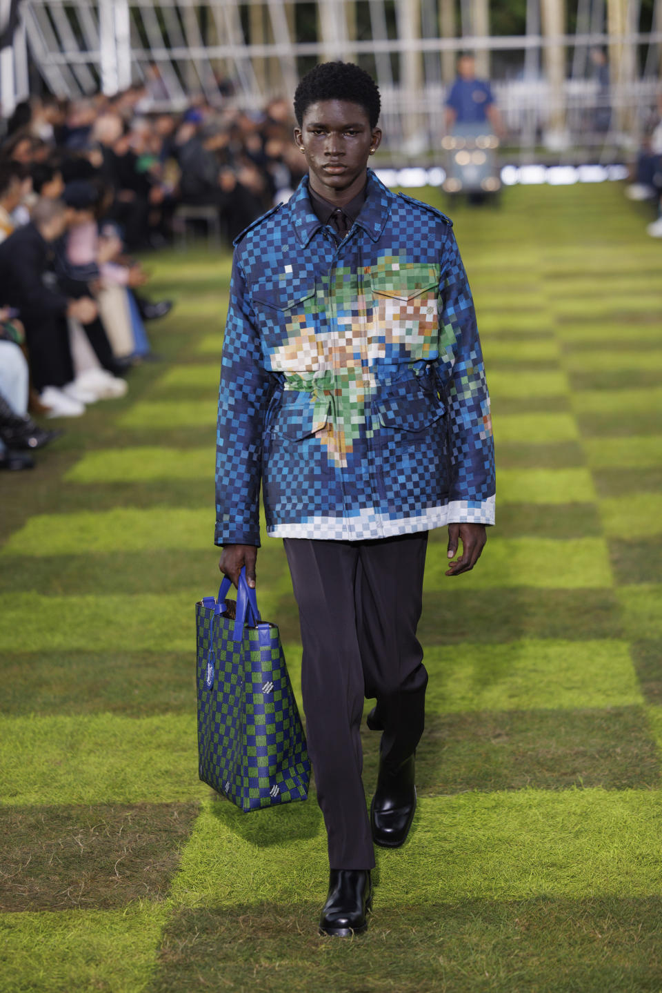 A model wears a creation as part of the Louis Vuitton Spring Summer 2025 collection, that was presented in Paris, France, Tuesday, June 18, 2024. (Photo by Vianney Le Caer/Invision/AP)