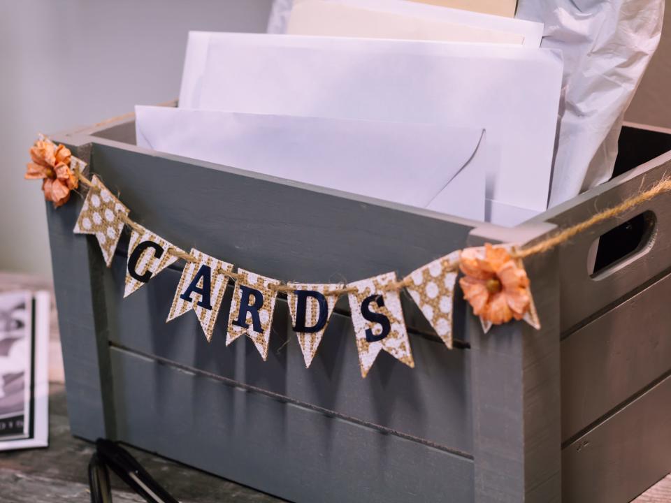 a wooden box for cards at a wedding - card box