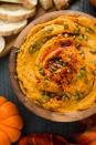 <p>Hummus receives a spicy fall upgrade with pumpkin puree, chipotle chiles, and roasted pumpkin seeds. </p><p><strong>Get the recipe at <a href="http://hostthetoast.com/smoky-chipotle-pumpkin-hummus/" rel="nofollow noopener" target="_blank" data-ylk="slk:Host the Toast;elm:context_link;itc:0;sec:content-canvas" class="link ">Host the Toast</a>.</strong></p>