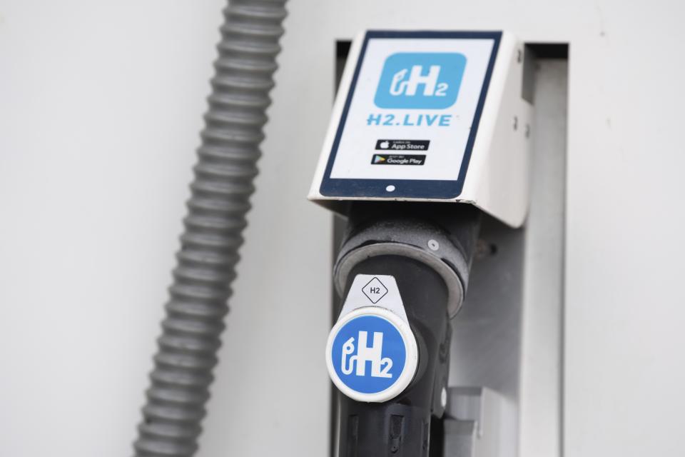 In this Monday June 8, 2020 photo a nozzle valve is attached to the dispenser of a hydrogen filling station in Dresden Germany. The German government is to agree its national hydrogen strategy for the coming decades, part of a plan to reduce the country's dependence on fossil fuels. (Sebastian Kahnert/dpa via AP)