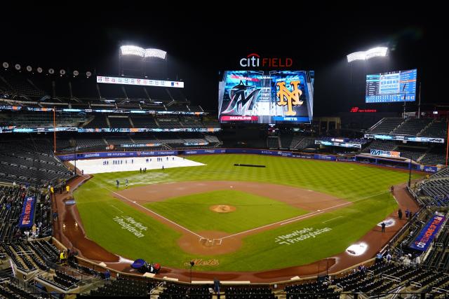 Marlins stumble on Opening Day as open roof leads to rain delay