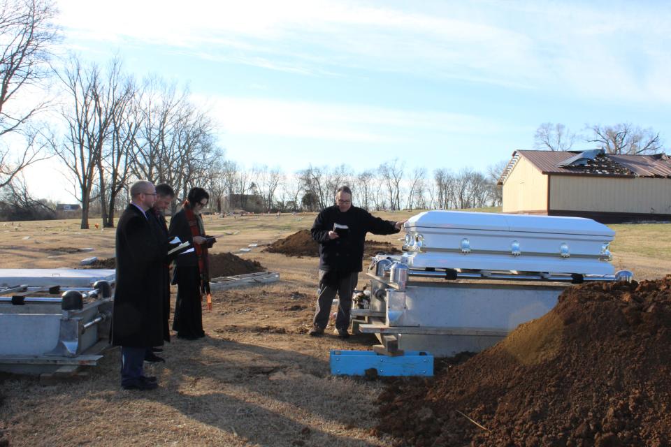 Clergy presiding over a funeral service on Jan. 26, 2022 for the Call the Name initiative to honor 
individuals who were deemed abandoned. From left to right, Brian Marcoulier, lead pastor of Bellevue United Methodist Church, Greg Bullard, pastor of Covenant of the Cross Church, Jeannie Alexander, an ordained minister and executive director of No Exceptions Prison Collective, and Jay Voorhees, pastor of City Road Chapel United Methodist Church.