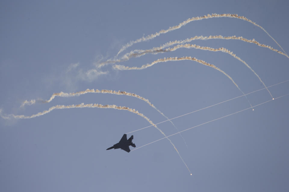 Israeli Air Force F-15 plane flies during a graduation ceremony for new pilots in Hatzerim air force base near the southern Israeli city of Beersheba, Israel, Wednesday, Dec. 26, 2018. (AP Photo/Ariel Schalit)