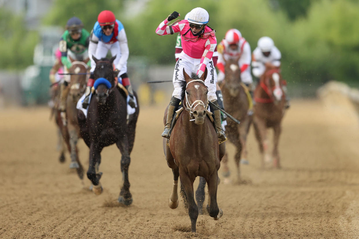 BALTIMORE, MARYLAND - MAY 15: Jockey Flavien Prat #6 riding Rombauer celebrates as he wins the 146th Running of the Preakness Stakes at Pimlico Race Course on May 15, 2021 in Baltimore, Maryland. (Photo by Patrick Smith/Getty Images)
