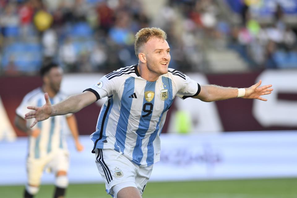 Argentina's Luciano Gondou celebrates after scoring the opening goal against Brazil during South America's under-23 pre-Olympic tournament soccer match at Brigido Iriarte stadium in Caracas, Venezuela, Sunday, Feb. 11, 2024. (AP Photo/Matias Delacroix)